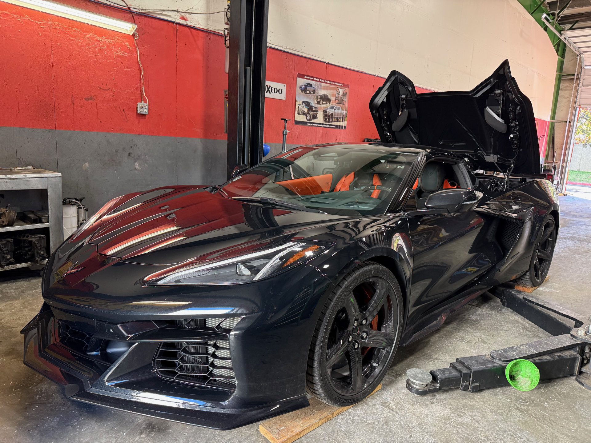 Black C8 Corvette in the Mach1 Motorsports shop